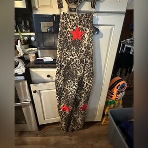 Dressed in LALA Wild Leopard Jumpsuit with Red Stars